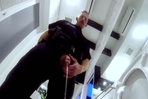 Buff Cop pisses And Cums