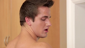 Next Door Male: Ex-Jock Leans on Kitchen Counter