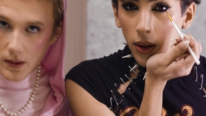 Femboyish: Fishnetted Fembots in Action